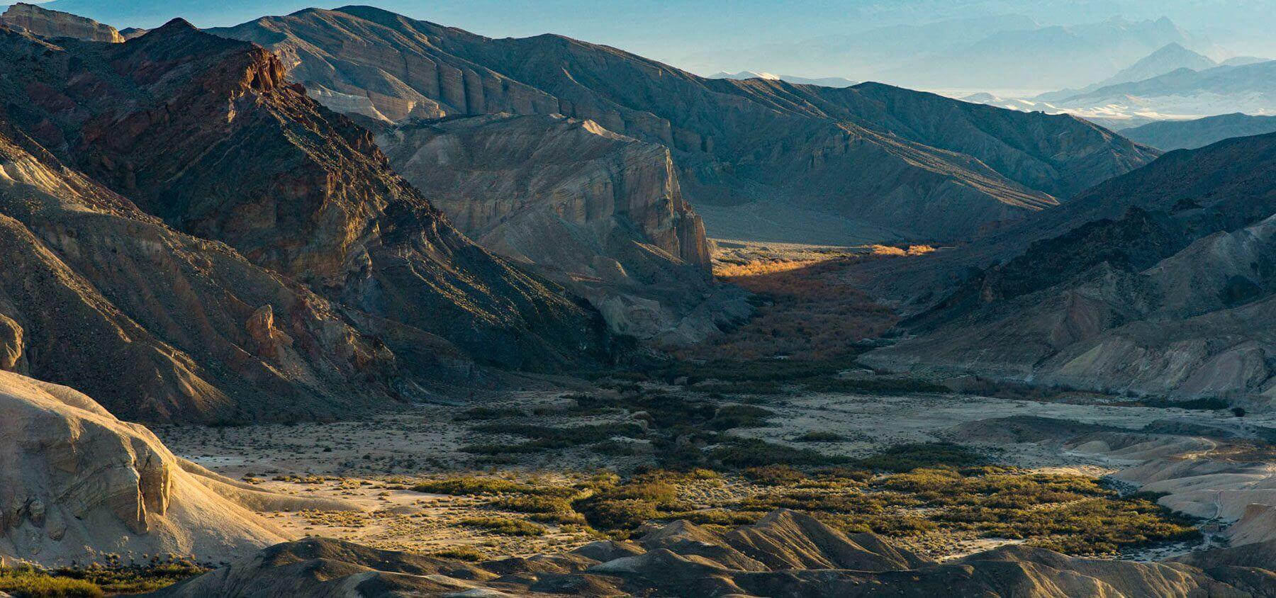 Rainbow Mountain in the Amargosa Basin near Death Valley, showing colorful folded rock layers of the Amargosa Chaos.